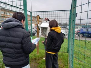 Students doing their daily atmospheric readings at the weather station